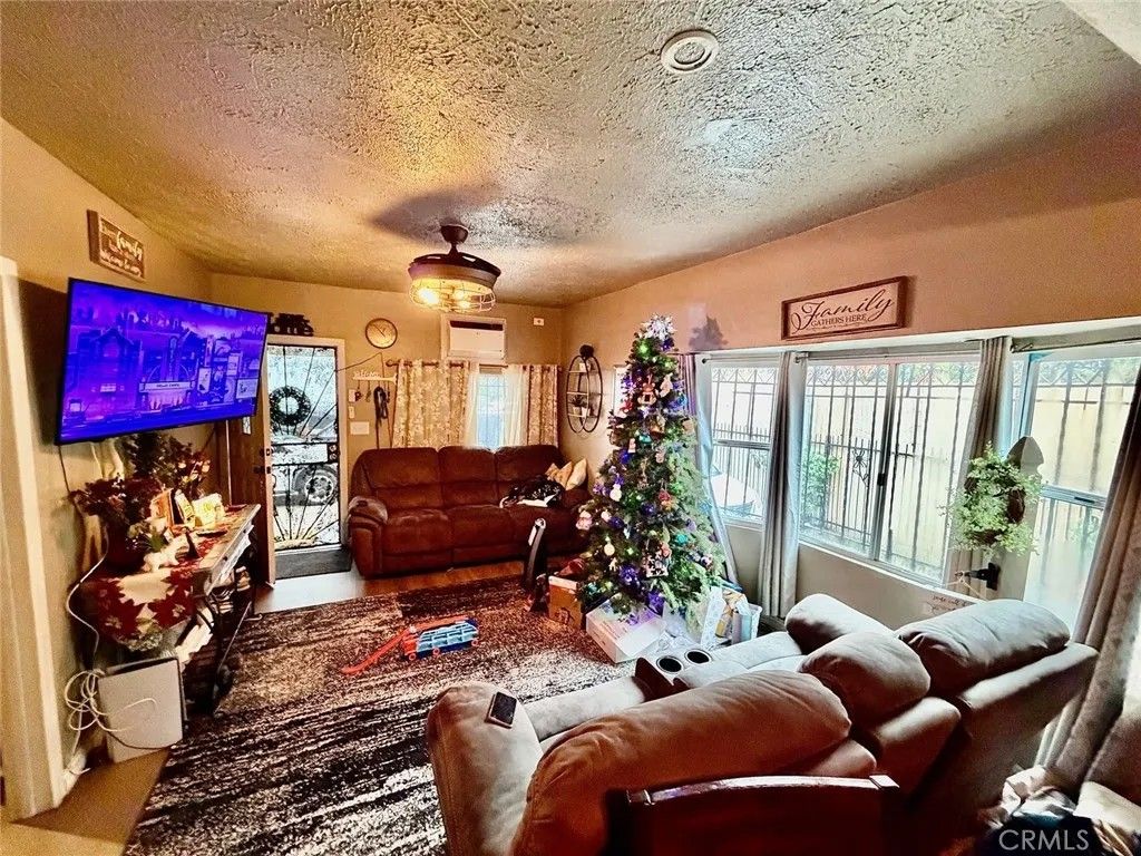 Photo of 1454 E 50th St, Los Angeles, CA 90011 (MLS # MB25279514)