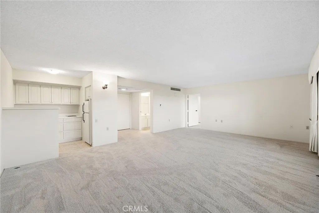 Photo of 24055 Paseo Del Lago #311, Laguna Woods, CA 92637 (MLS # OC26044164)