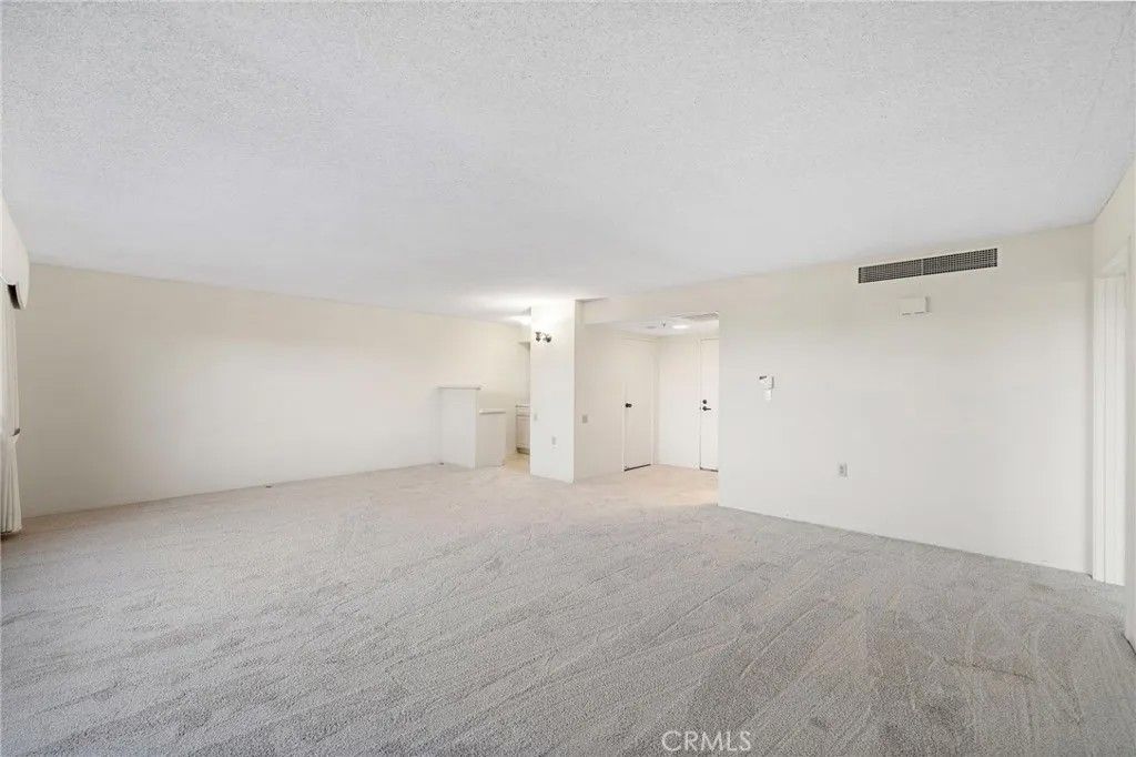 Photo of 24055 Paseo Del Lago #311, Laguna Woods, CA 92637 (MLS # OC26044164)