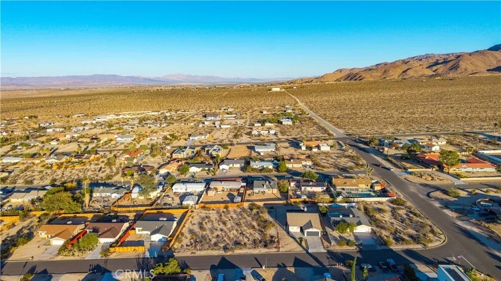 Photo of 6859 Pine Springs, 29 Palms, CA 92277 (MLS # JT25246675)