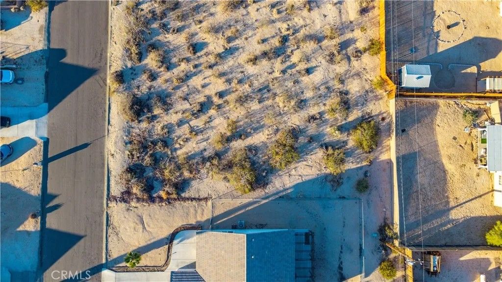 Photo of 6859 Pine Springs, 29 Palms, CA 92277 (MLS # JT25246675)