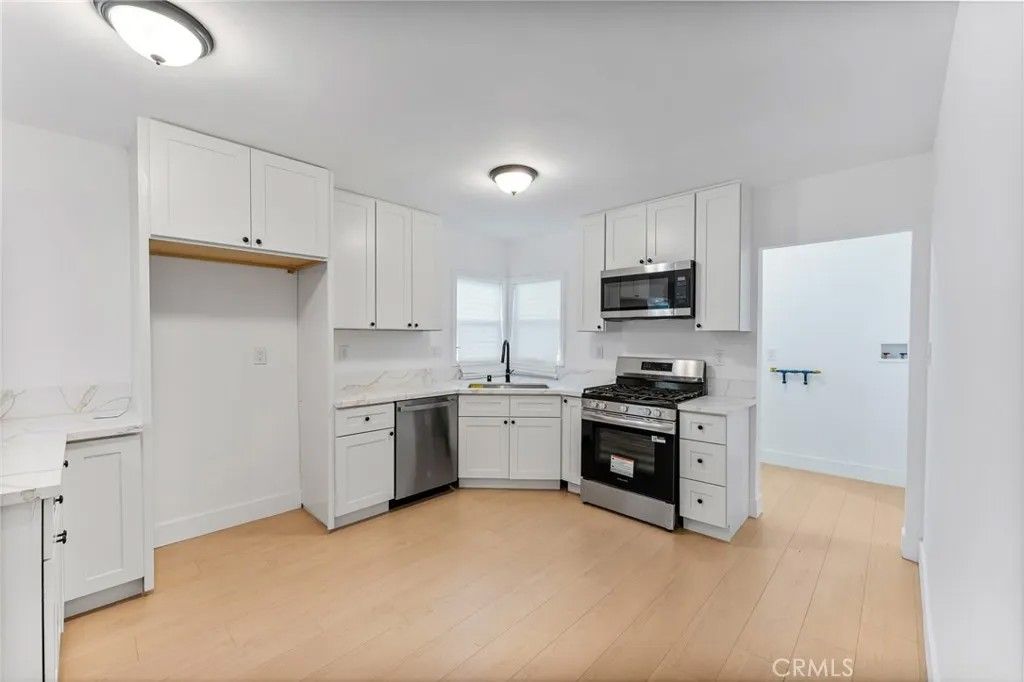 Photo of 4909 Fidler Ave, Lakewood, CA 90712 (MLS # OC25278366)