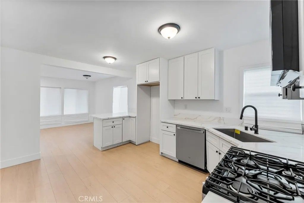 Photo of 4909 Fidler Ave, Lakewood, CA 90712 (MLS # OC25278366)