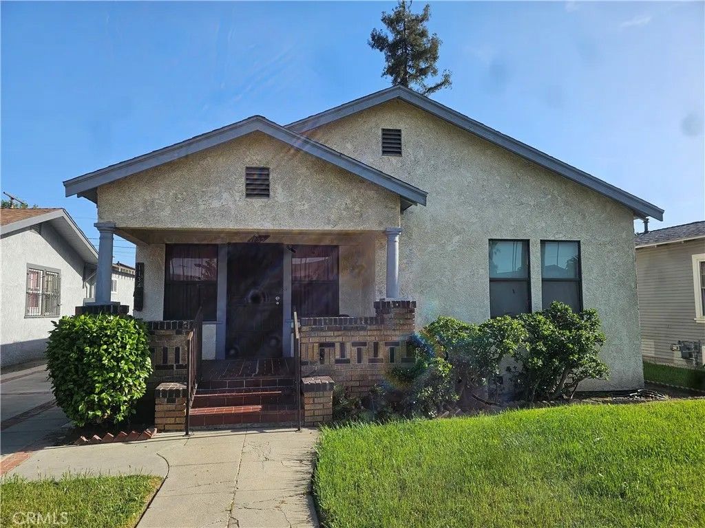 Photo of 1132 W 56th St, Los Angeles, CA 90037 (MLS # SB26086769)