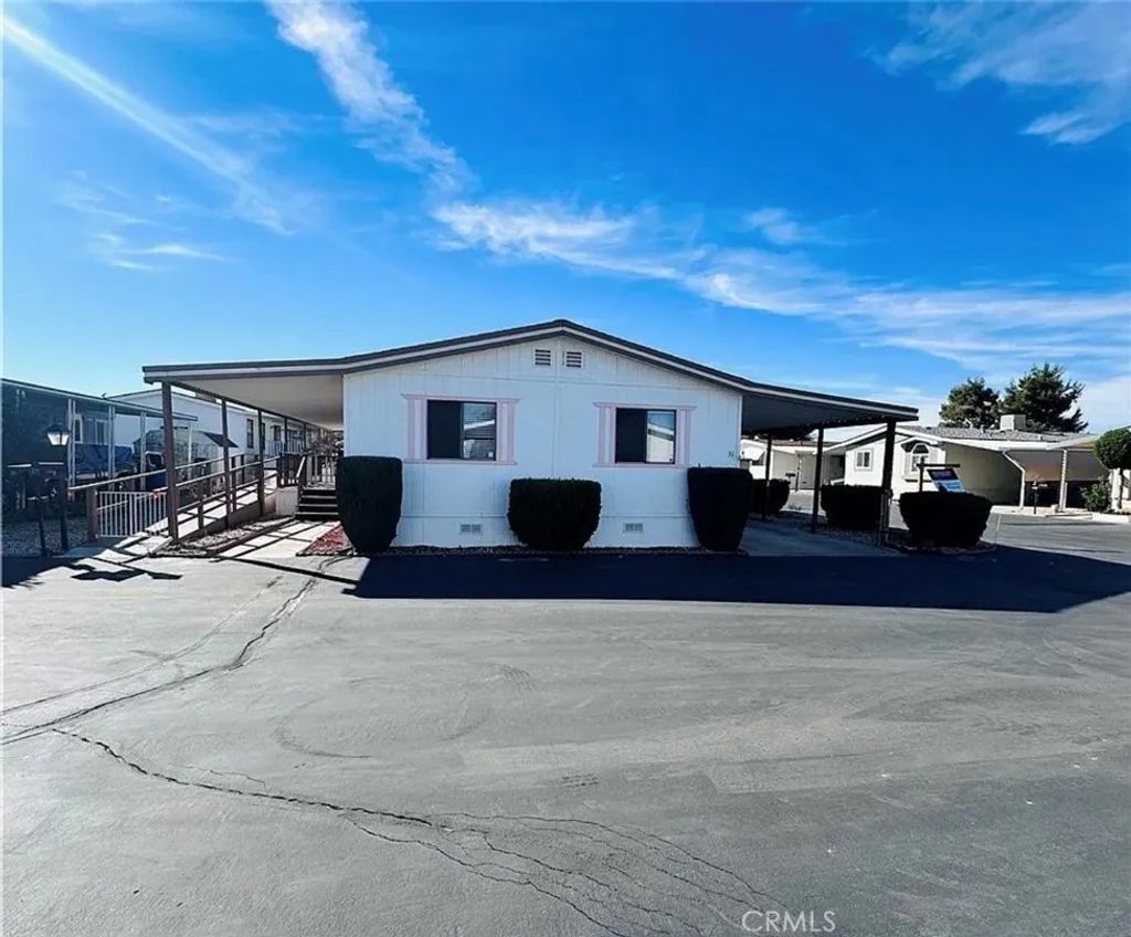 Photo of 14000 El Evado Rd #51, Victorville, CA 92392 (MLS # HD26097837)