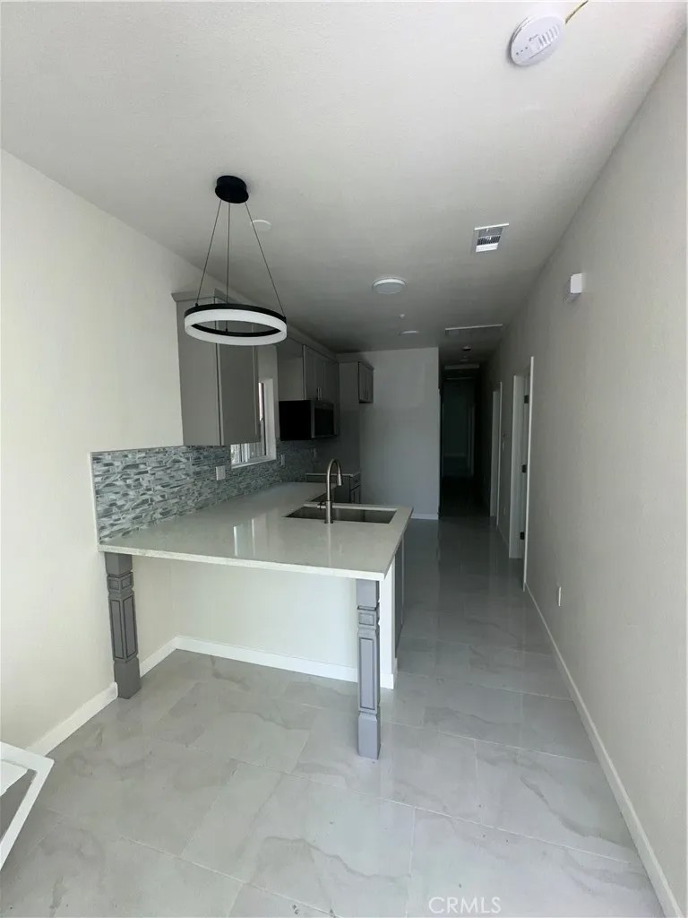 2411 E 113th
