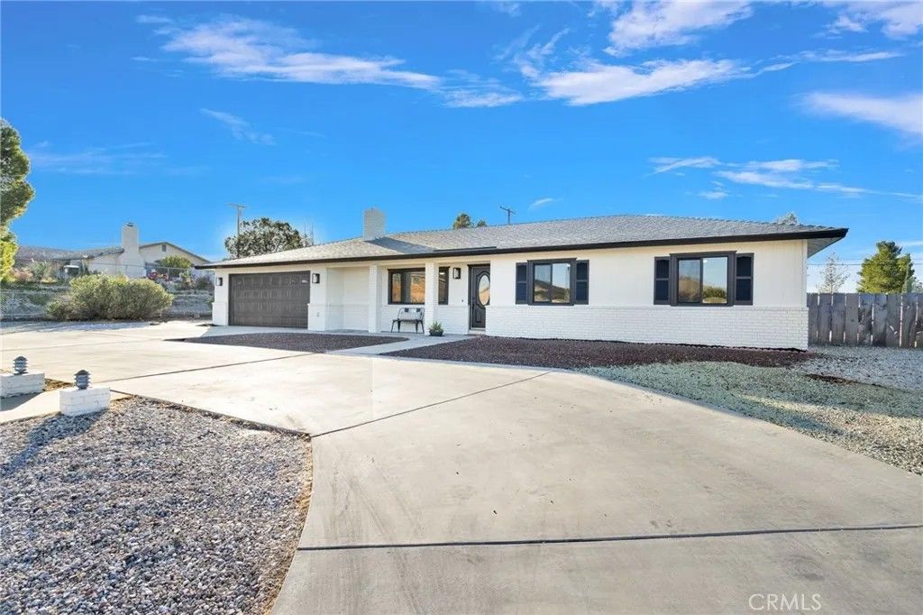 Photo of 16096 Village Drive, Victorville, CA 92394 (MLS # IV26022913)