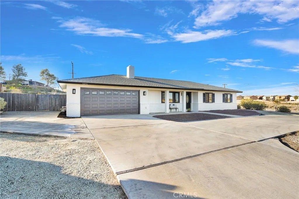 Photo of 16096 Village Drive, Victorville, CA 92394 (MLS # IV26022913)