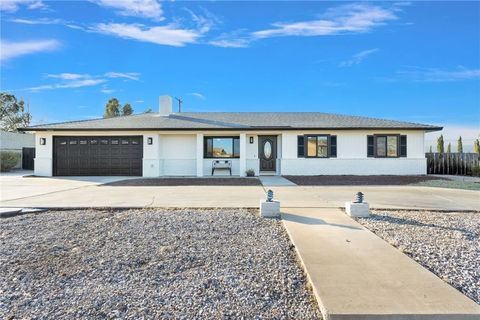 Photo of 16096 Village Drive, Victorville, CA 92394 (MLS # IV26022913)