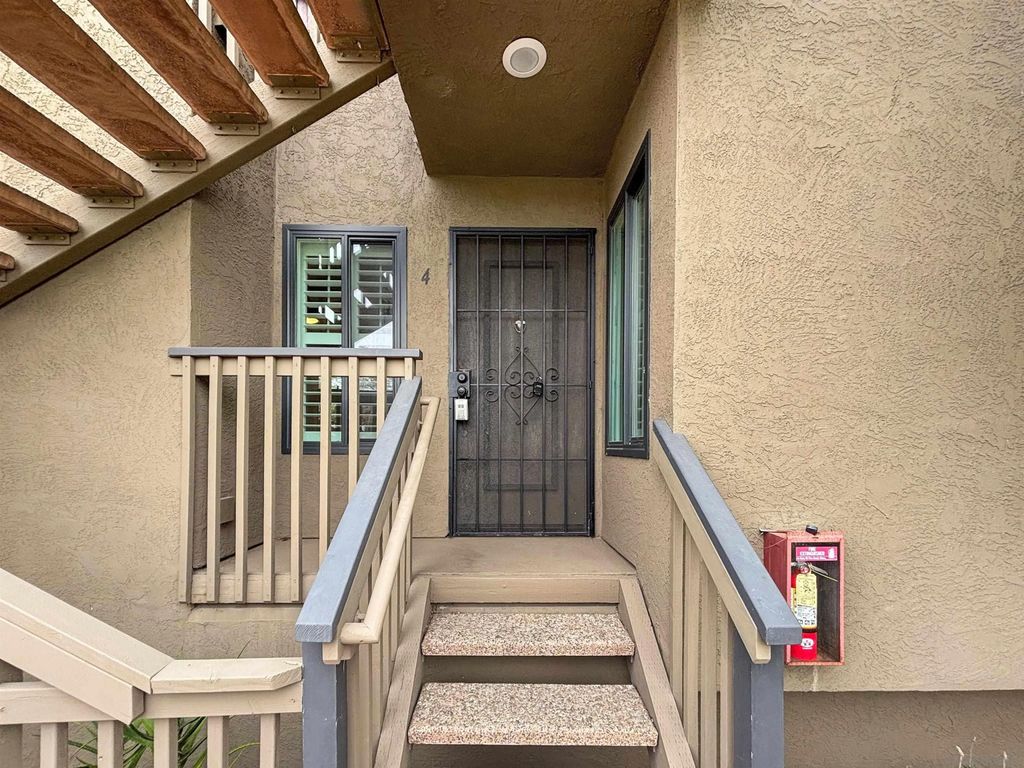 Photo of 6025 Estelle St #4, San Diego, CA 92115 (MLS # 260008812)