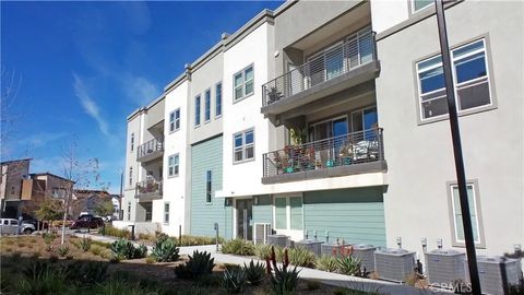 Photo of 26976 Prospector Road #201, Valencia, CA 91381 (MLS # SR25035937)