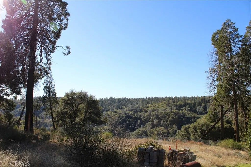 Photo of 13911 Cluster Ct, Magalia, CA 95954 (MLS # SN25248391)