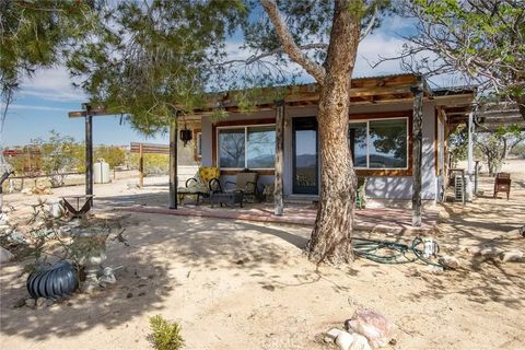 Photo of 63720 Pluto Road, Joshua Tree, CA 92252 (MLS # JT26052306)