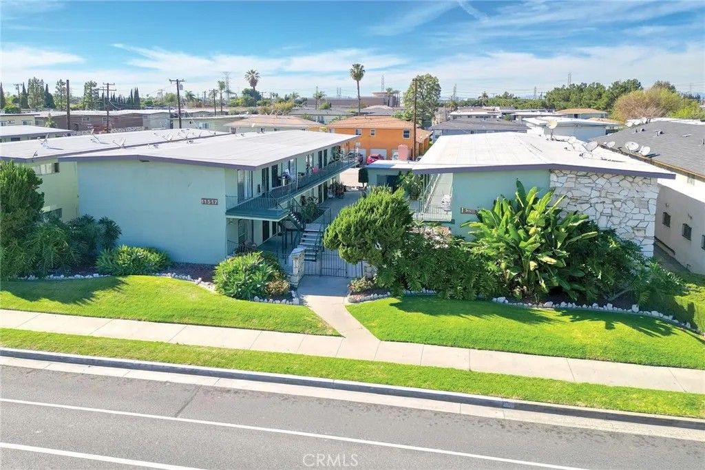 Photo of 11517 Old River School Rd, Downey, CA 90241 (MLS # CV26059950)
