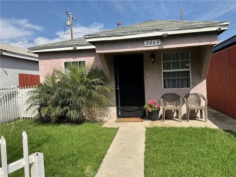 Photo of 2063 E Knopf St, Compton, CA 90222 (MLS # DW26063930)