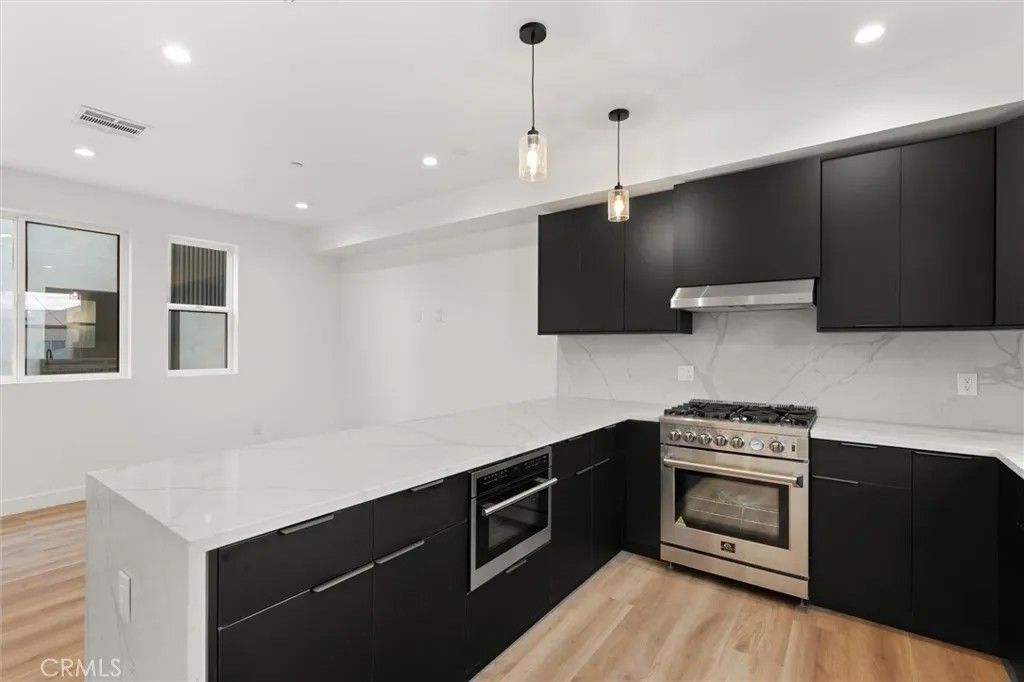 Photo of 11408 W Calvert Street, North Hollywood, CA 91606 (MLS # SB26002801)