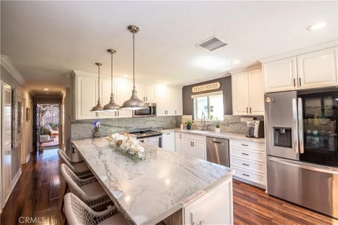 Photo of 4438 Kittiwake Way, Oceanside, CA 92057 (MLS # ND26192321)