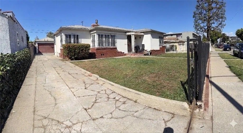Photo of 1445 104 St, Los Angeles, CA 90047 (MLS # CV26079336)