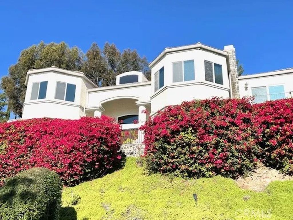 Photo of 401 Puddingstone Dr, San Dimas, CA 91773 (MLS # AR26005262)