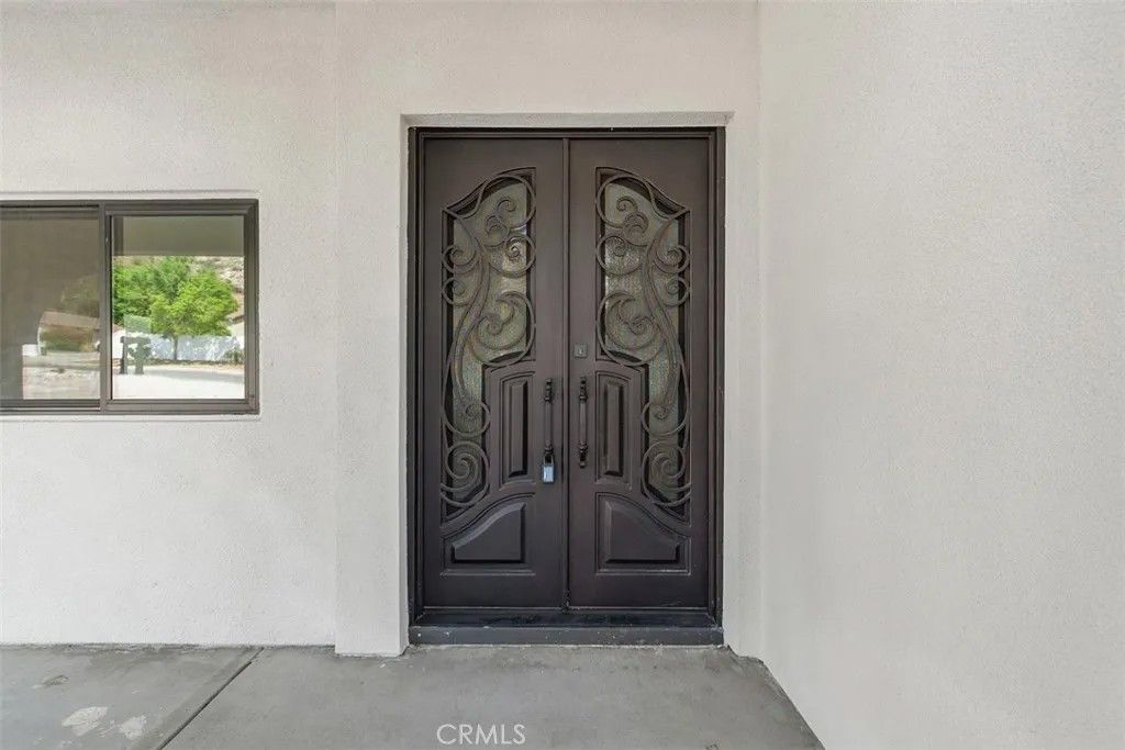 Photo of 4477 Gilchrist Drive, Riverside, CA 92505 (MLS # IV26104800)