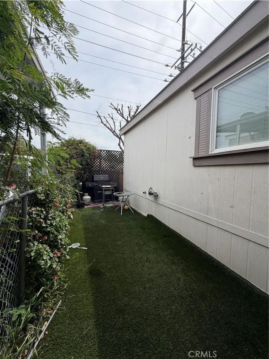 Photo of 20401 Soledad Canyon Road #406, Canyon Country, CA 91351 (MLS # SR26077411)