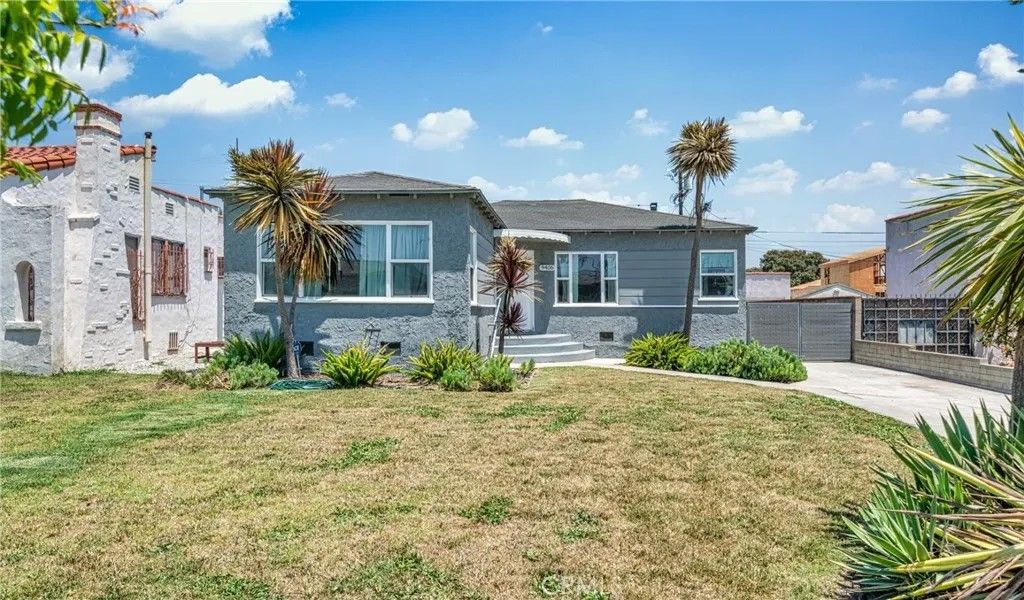 Photo of 9406 S Harvard Boulevard, Los Angeles, CA 90047 (MLS # WS26015599)