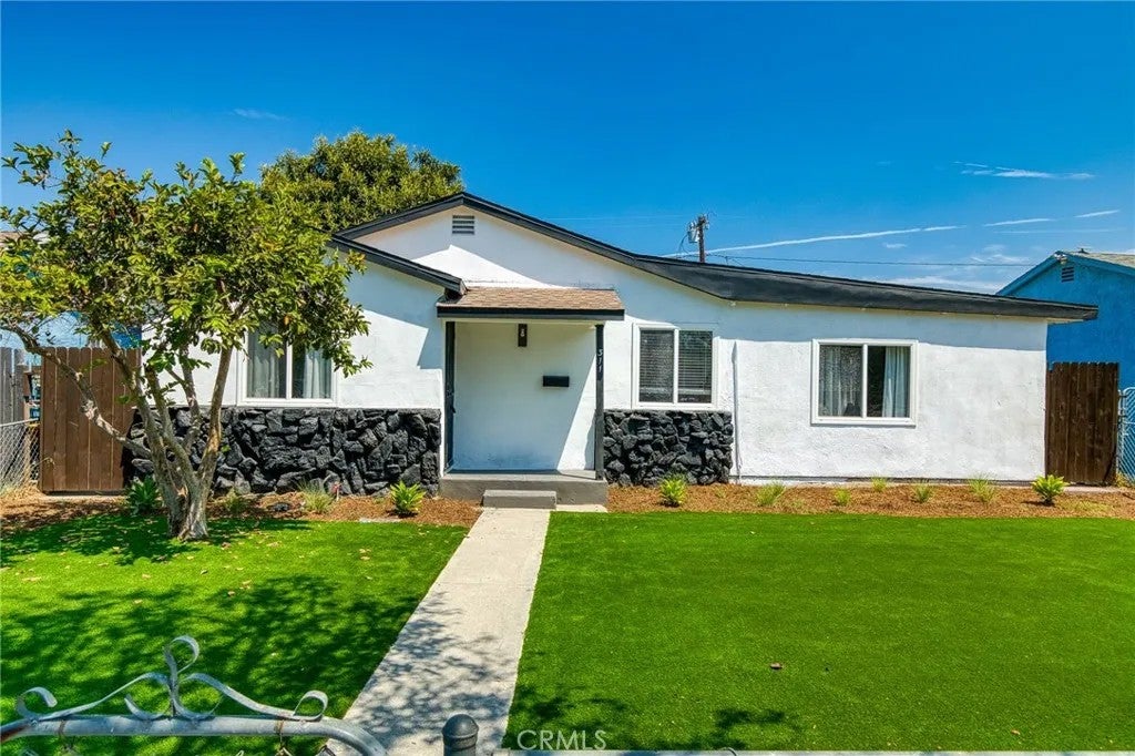 Photo of 311 E Cummings Lane, Long Beach, CA 90805 (MLS # PW26176122)