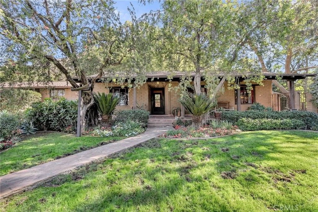 Photo of 6146 Hawarden Drive, Riverside, CA 92506 (MLS # IV25260007)