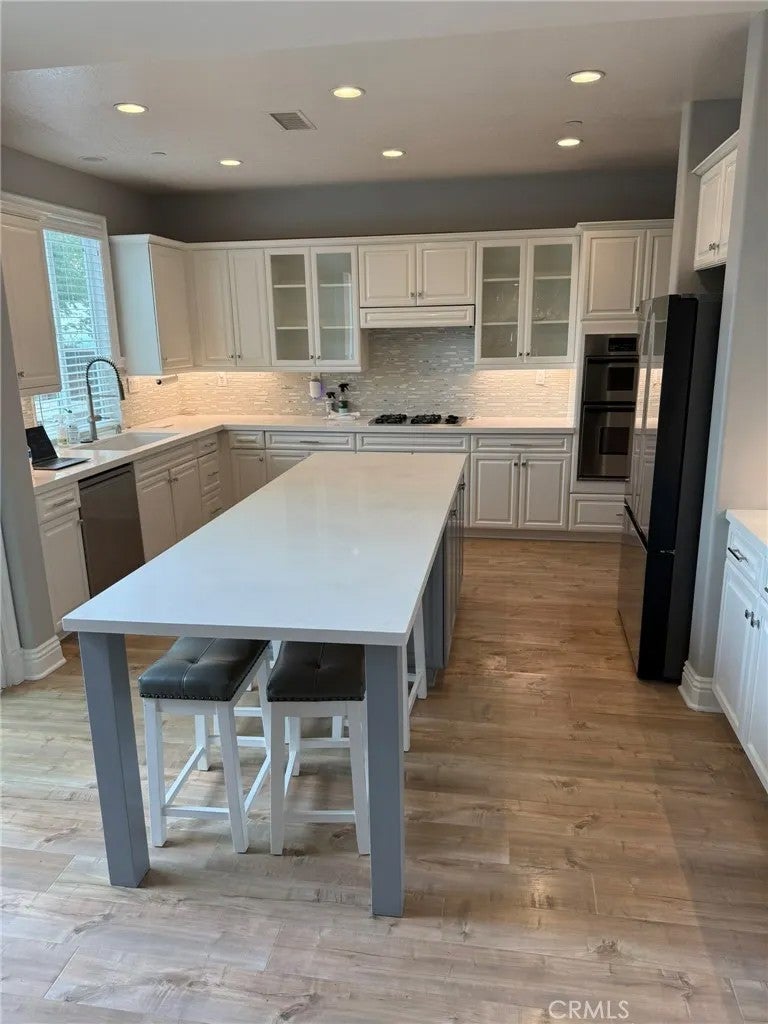 Photo of 8118 E Loftwood Lane, Orange, CA 92867 (MLS # PW26234485)