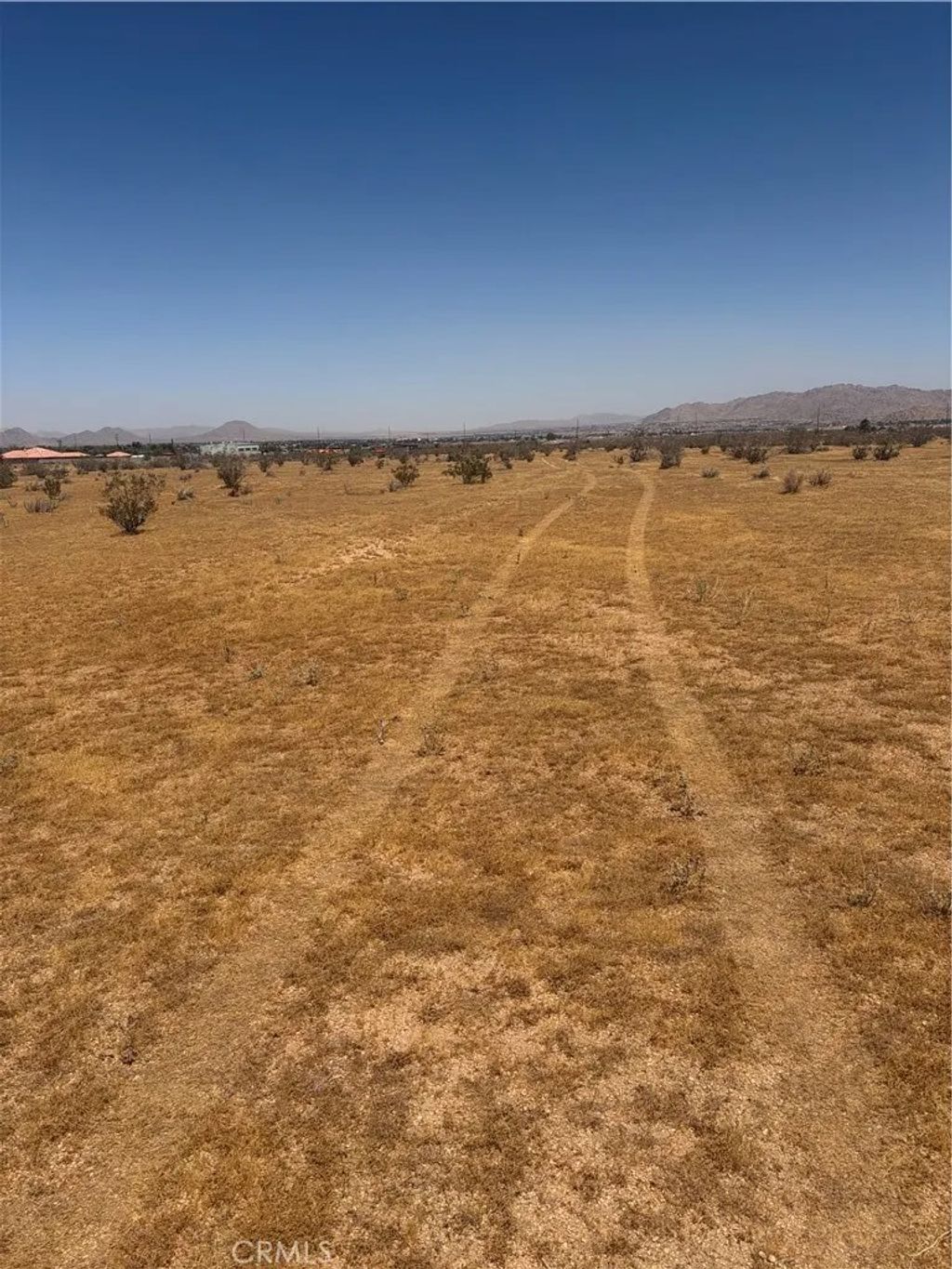 Photo of 23421 Colony Rd, Apple Valley, CA 92308 (MLS # HD26107060)