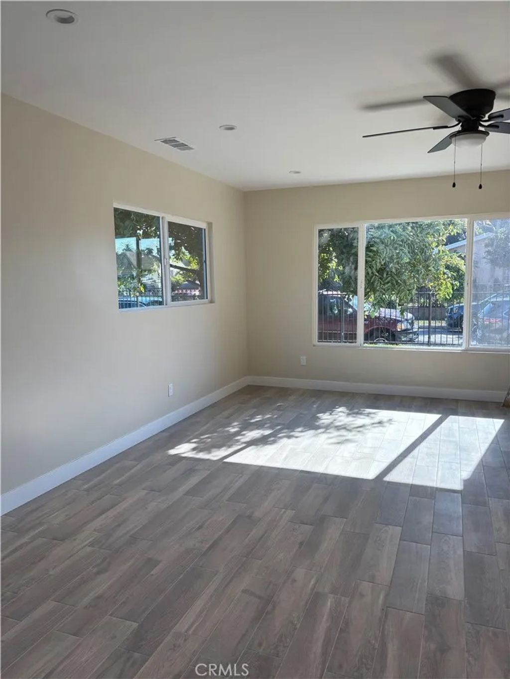 Photo of 6537 San Miguel St, Paramount, CA 90723 (MLS # SR25278716)