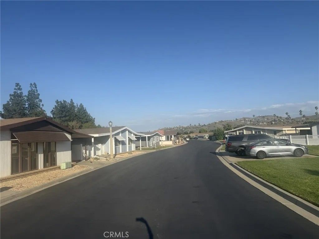 Photo of 13381 Magnolia Ave #124, Corona, CA 92879 (MLS # CV26061682)