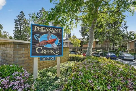 Photo of 20702 El Toro Rd #16, Lake Forest, CA 92630 (MLS # PW26051024)