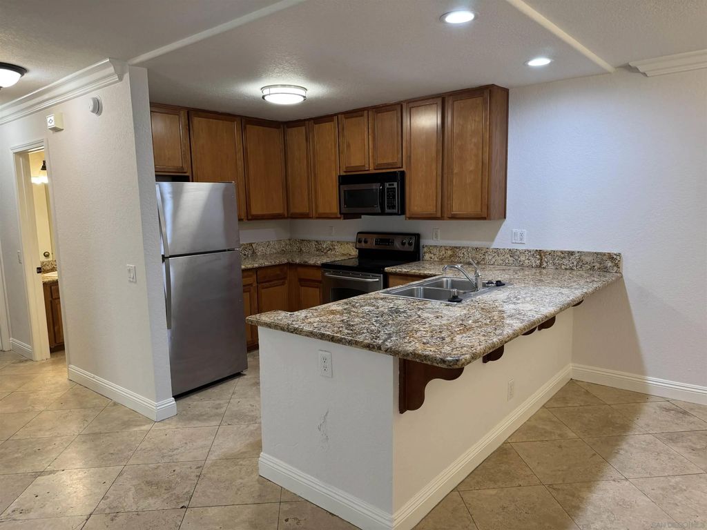 Photo of 1075 N Escondido Blvd #104, Escondido, CA 92026 (MLS # 250029299)