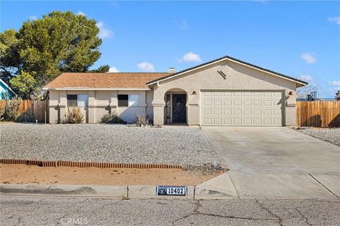 Photo of 10402 Cimmeron Trail Drive, Adelanto, CA 92301 (MLS # IV26058692)