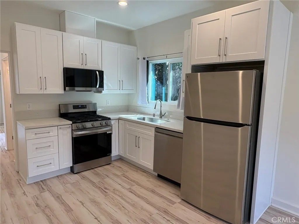 Photo of 22119 San Miguel Street, Woodland Hills, CA 91364 (MLS # SR26067440)