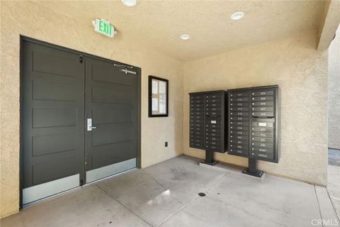 Tiny photo for 22038 Vanowen St #215, Woodland Hills, CA 91303 (MLS # SR25235684)