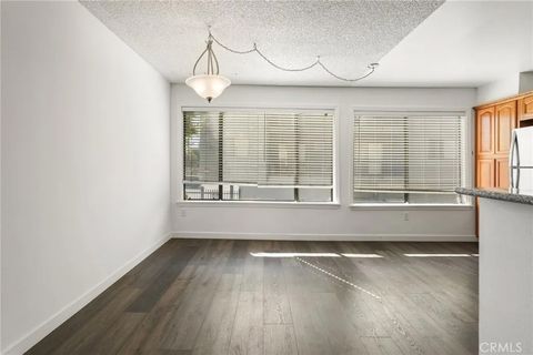 Tiny photo for 22038 Vanowen St #215, Woodland Hills, CA 91303 (MLS # SR25235684)