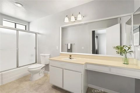 Tiny photo for 22038 Vanowen St #215, Woodland Hills, CA 91303 (MLS # SR25235684)