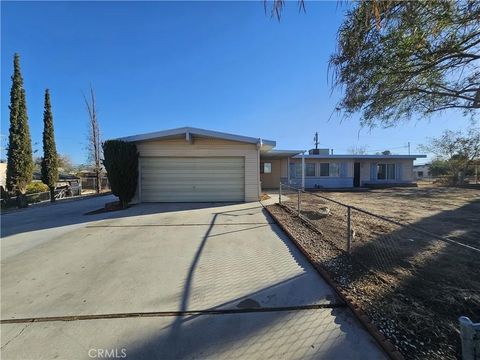 Photo of 15801 Malpais Ln, Victorville, CA 92394 (MLS # CV25245840)