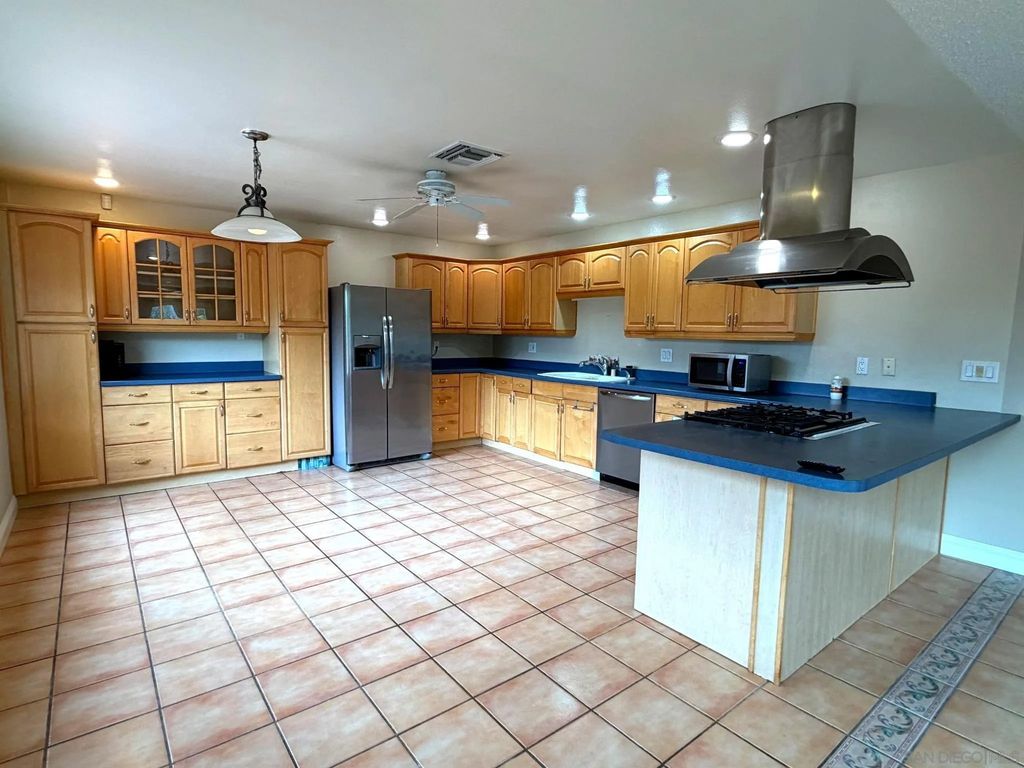 Photo of 469 Lado De Loma Dr, Vista, CA 92083 (MLS # 260006887)