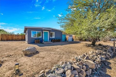 Photo of 74825 Alta Loma Dr, 29 Palms, CA 92277 (MLS # JT25256660)