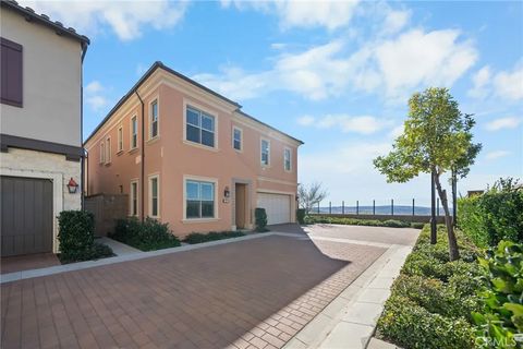 Photo of 137 Trumpet Flower, Irvine, CA 92618 (MLS # SR25273531)