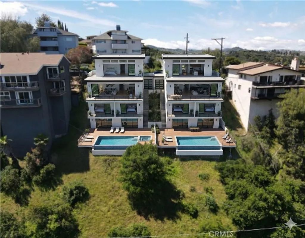 Photo of 21478 Iglesia Dr, Woodland Hills, CA 91364 (MLS # SR26087702)