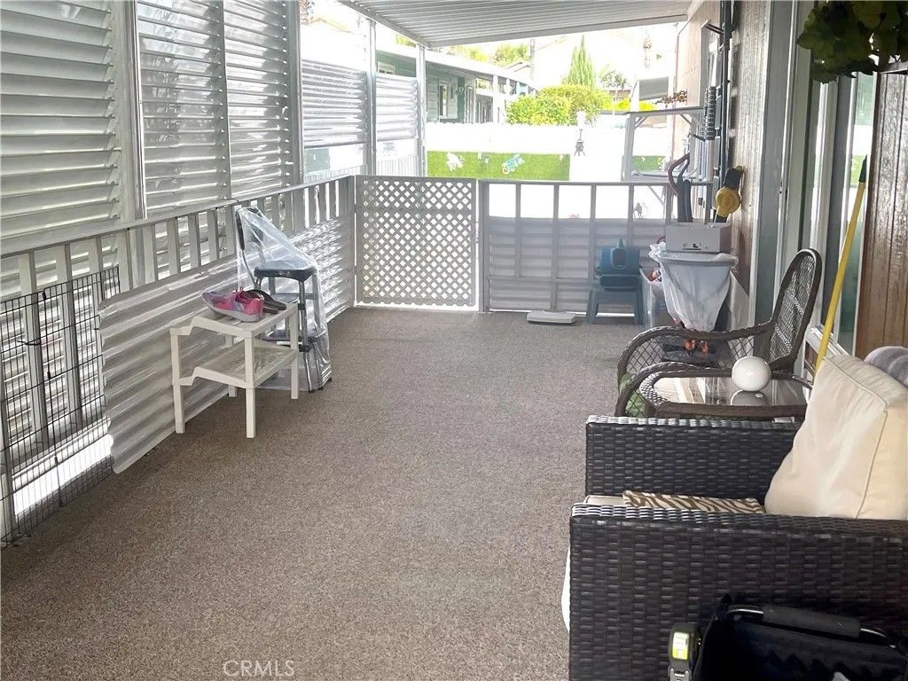 Photo of 23820 Ironwood Ave #61, Moreno Valley, CA 92557 (MLS # SW26002076)