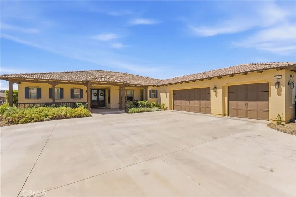 Photo of 7887 Arroyo Vista Court, Riverside, CA 92506 (MLS # OC26123619)