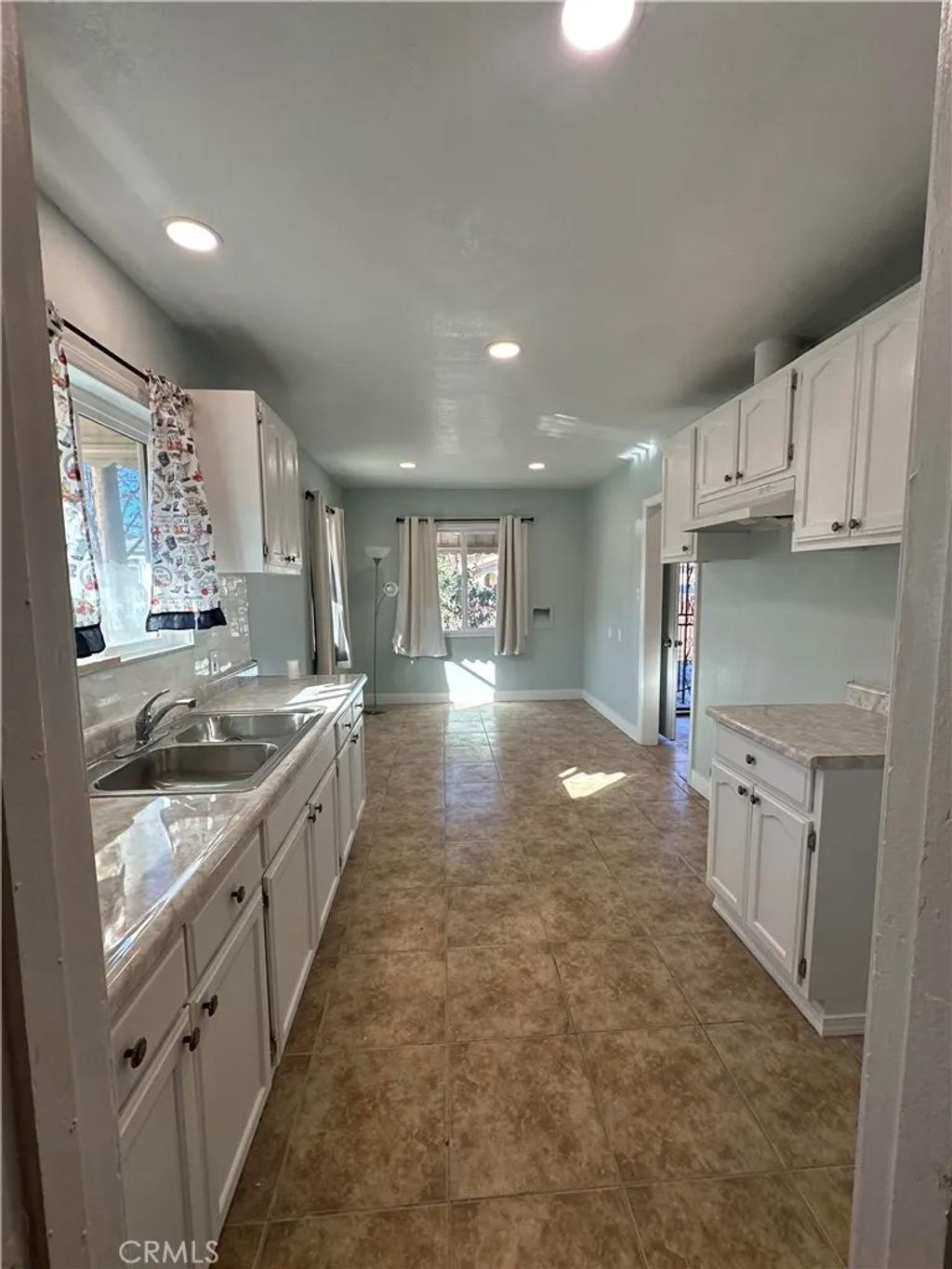 Photo of 6052 Fishburn Ave, Huntington Park, CA 90255 (MLS # CV26011833)