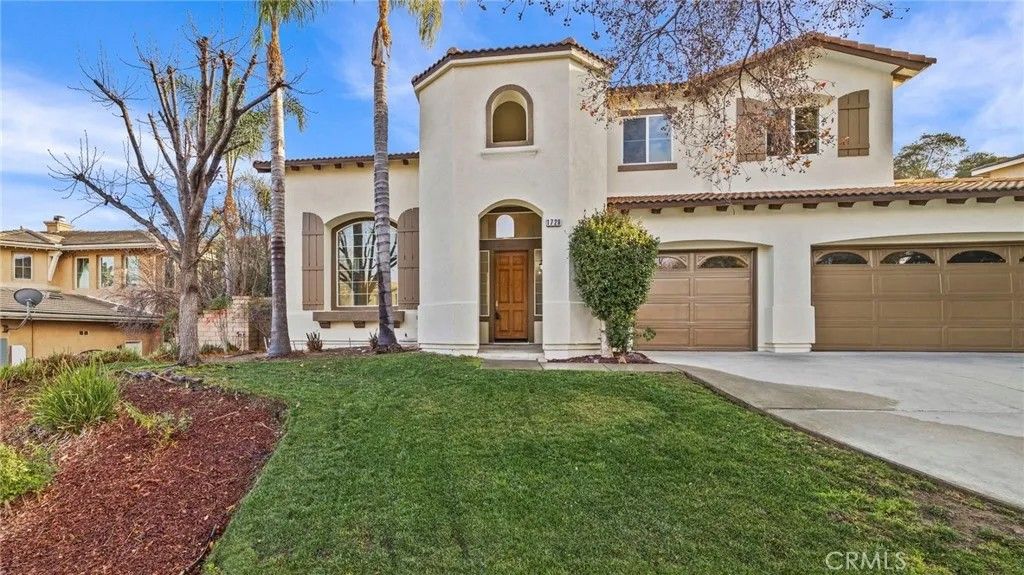 Photo of 1728 Tamarron Drive, Corona, CA 92883 (MLS # IG25182348)