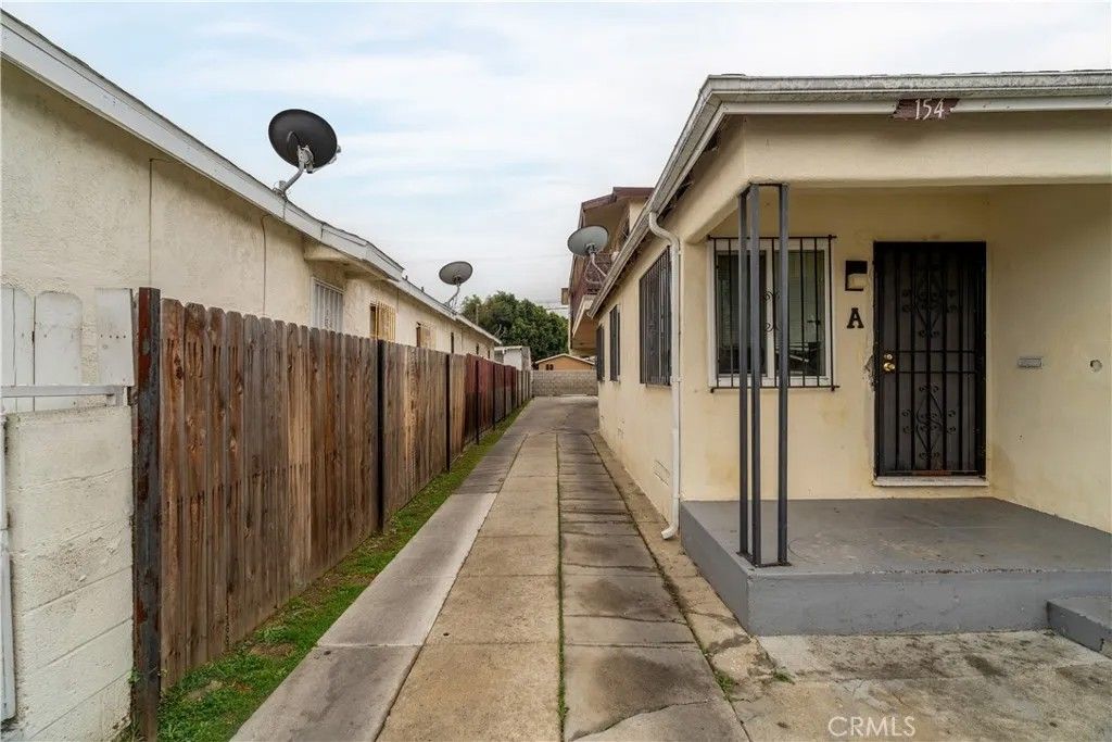 Photo of 154 E 82nd Place, Los Angeles, CA 90003 (MLS # PW26013751)