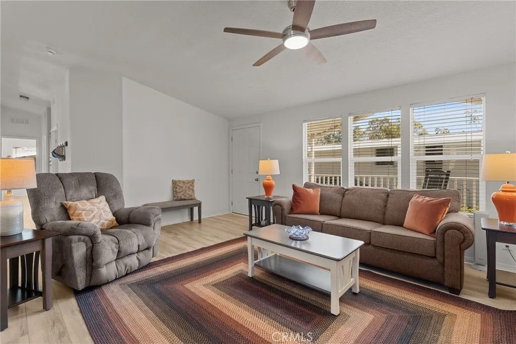 Photo of 24001 Muirlands Blvd #12, Lake Forest, CA 92630 (MLS # OC26045196)